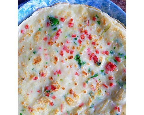 煎出金黄美味，玉米火腿鸡蛋饼食谱（健康简单易做，营养丰富的早餐选择）
