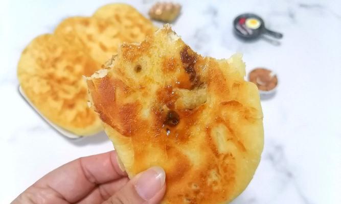 传统美味（掌握糕点的基本技巧，做出口感酥脆的糖饼）
