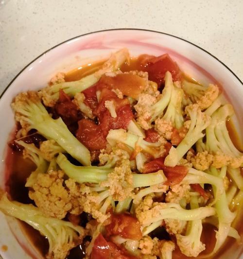 西红柿鸡蛋炒菜花的做法（传统美味家常菜，简单易学的烹饪方法）