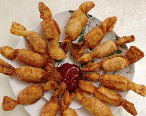 美味可口的糖果脆骨香肠的制作方法（用家庭厨房的食材轻松制作，美味简单易学）