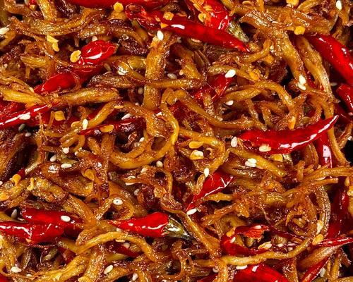 双椒炒鸡丝的制作方法（辣爽口感，鲜美可口，家庭必备）