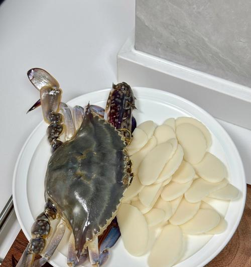 用梭子蟹烹饪美味年糕（探索梭子蟹与年糕的完美结合）