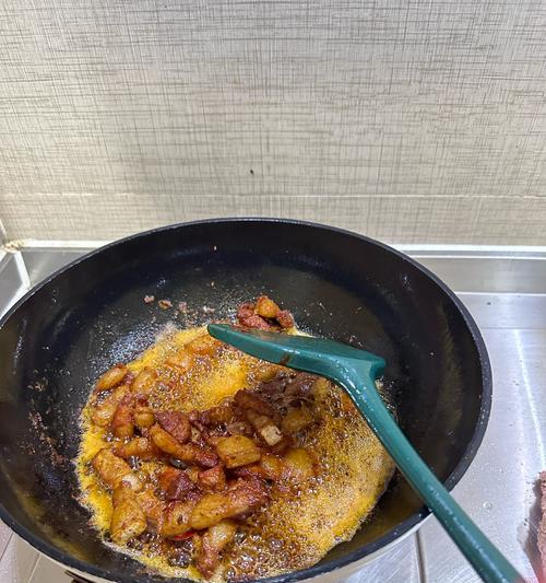 五花肉炒苦瓜片，做法详解（美味又健康的家常菜，快来试试吧！）