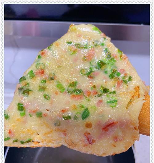 教你用香烙做出美味鸡蛋饼（手把手教你制作又香又脆的香烙鸡蛋饼）